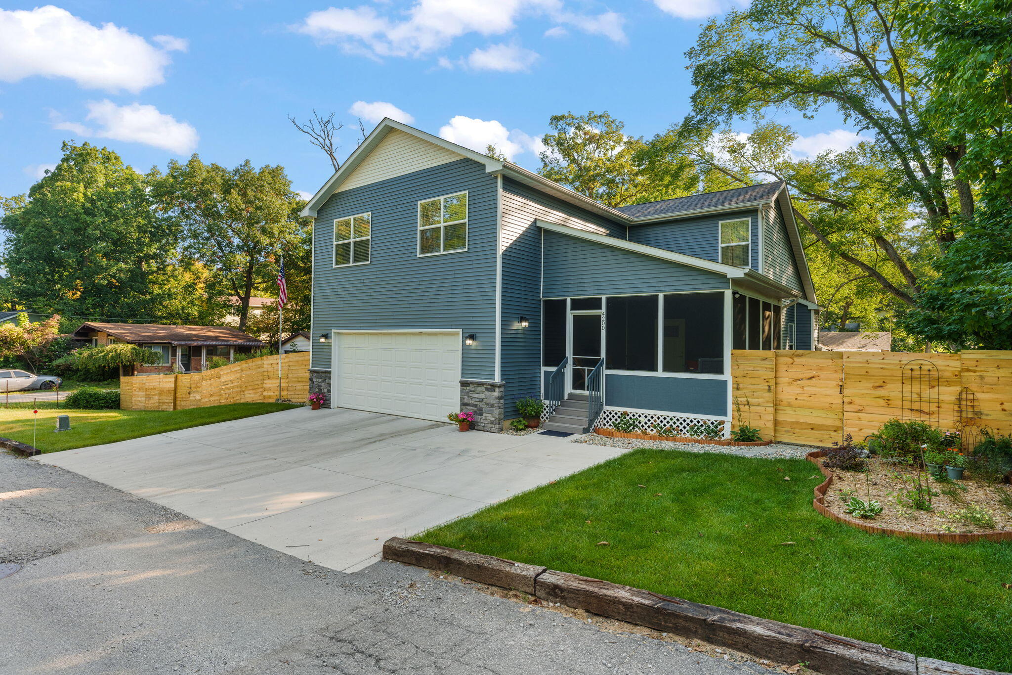 4200 Cardinal Lane Valparaiso, IN 46383 - Photo 2 of 44 a front view of a house with a yard and porch