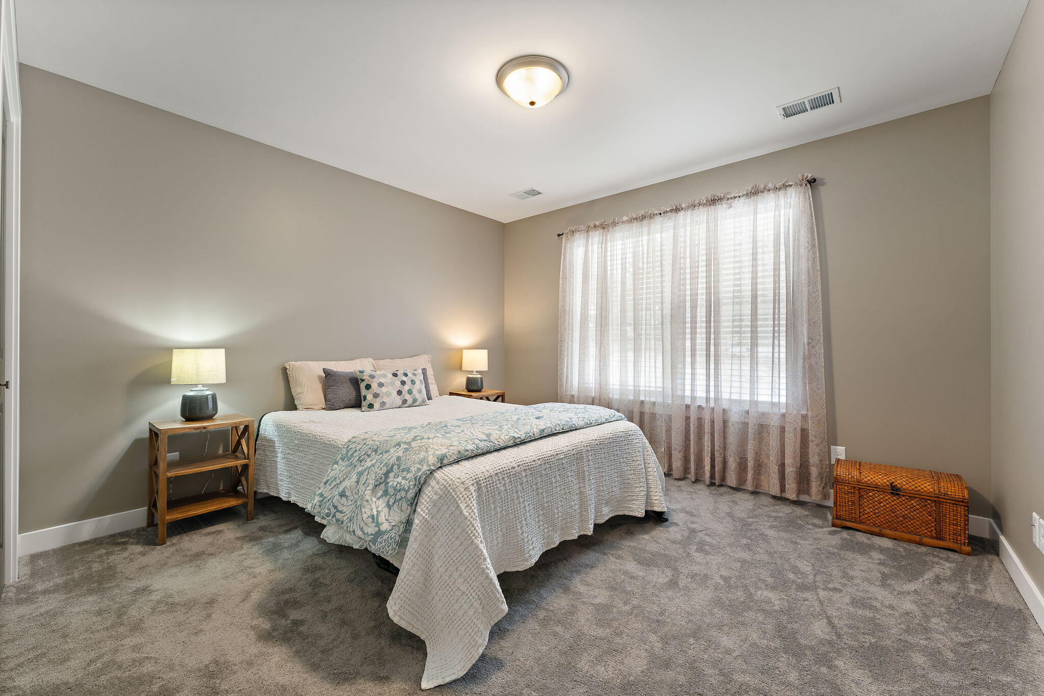 4200 Cardinal Lane Valparaiso, IN 46383 - Photo 24 of 44 a spacious bedroom with a bed and a window