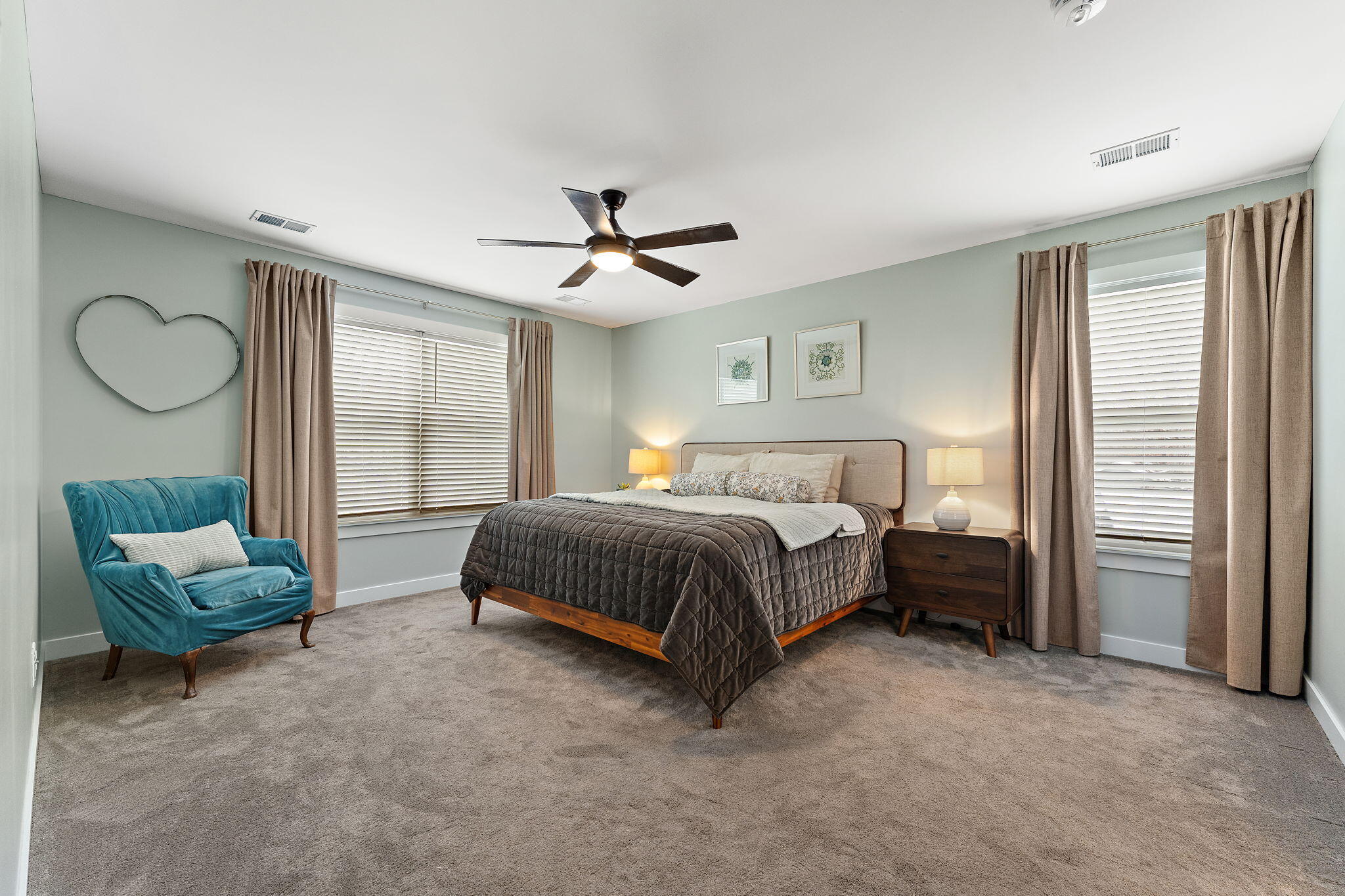 4200 Cardinal Lane Valparaiso, IN 46383 - Photo 25 of 44 a bedroom with a bed a couch and a large window