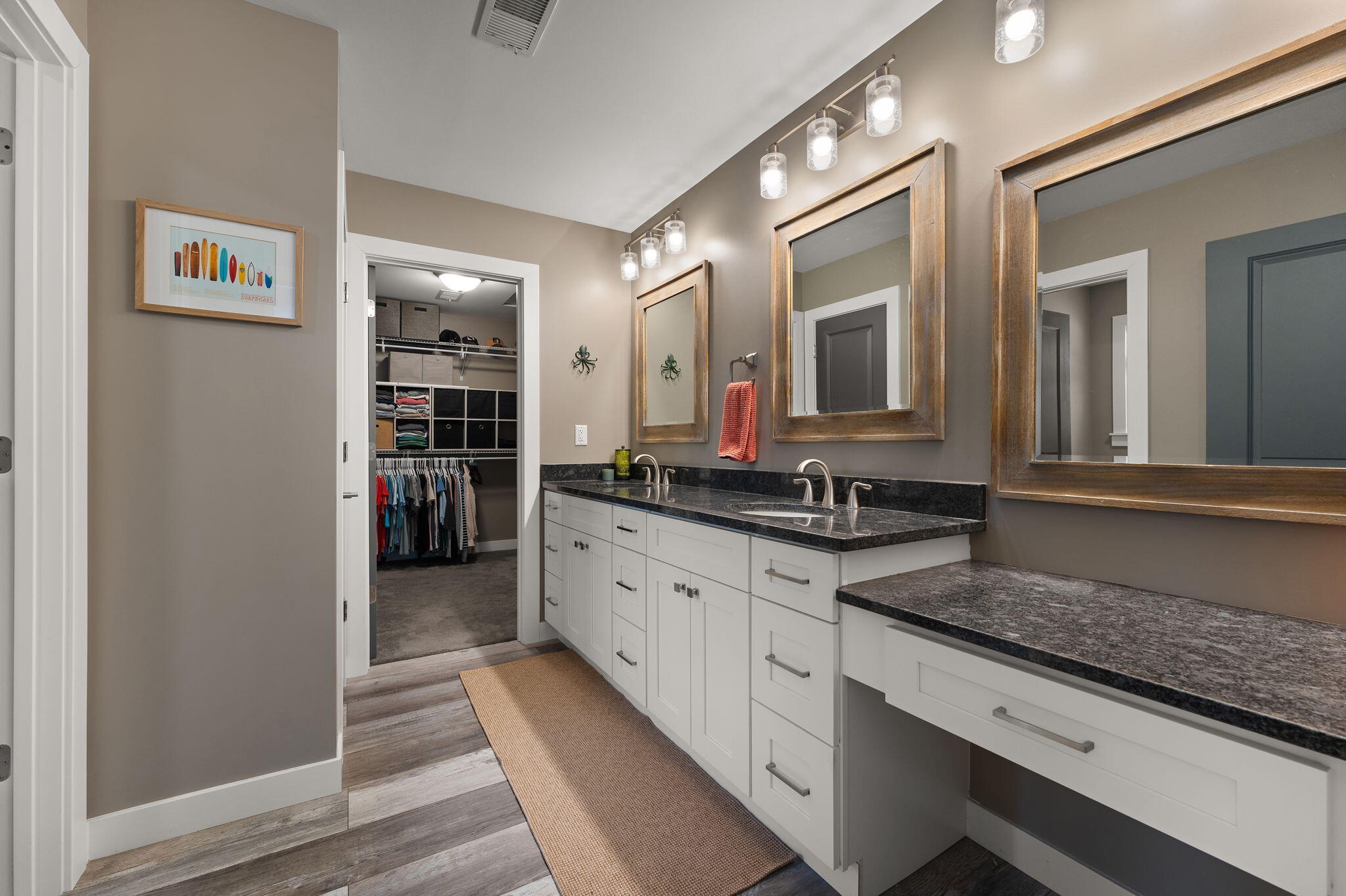 4200 Cardinal Lane Valparaiso, IN 46383 - Photo 26 of 44 a spacious bathroom with a granite countertop sink and a mirror