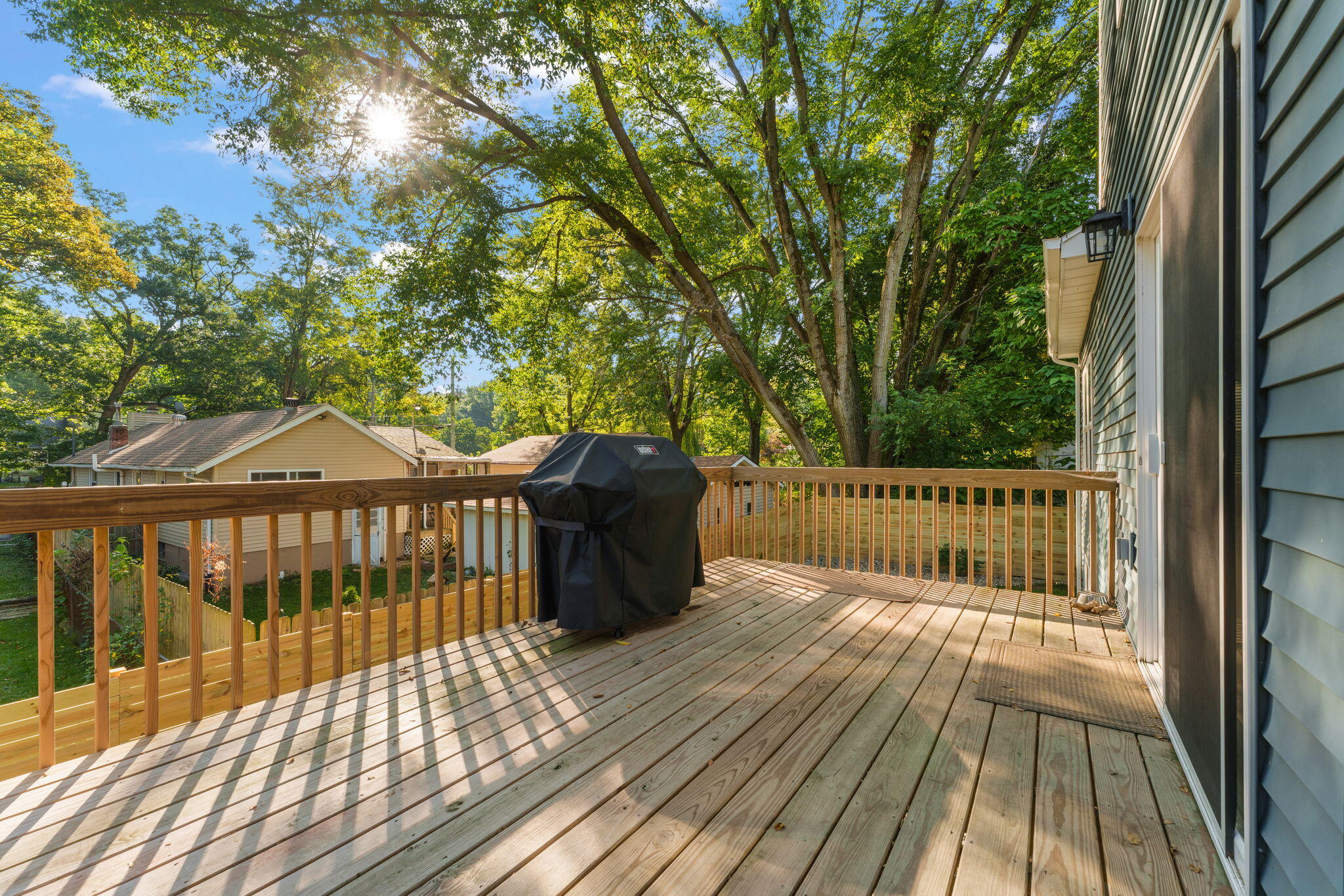 4200 Cardinal Lane Valparaiso, IN 46383 - Photo 39 of 44 a view of a wooden deck with a yard