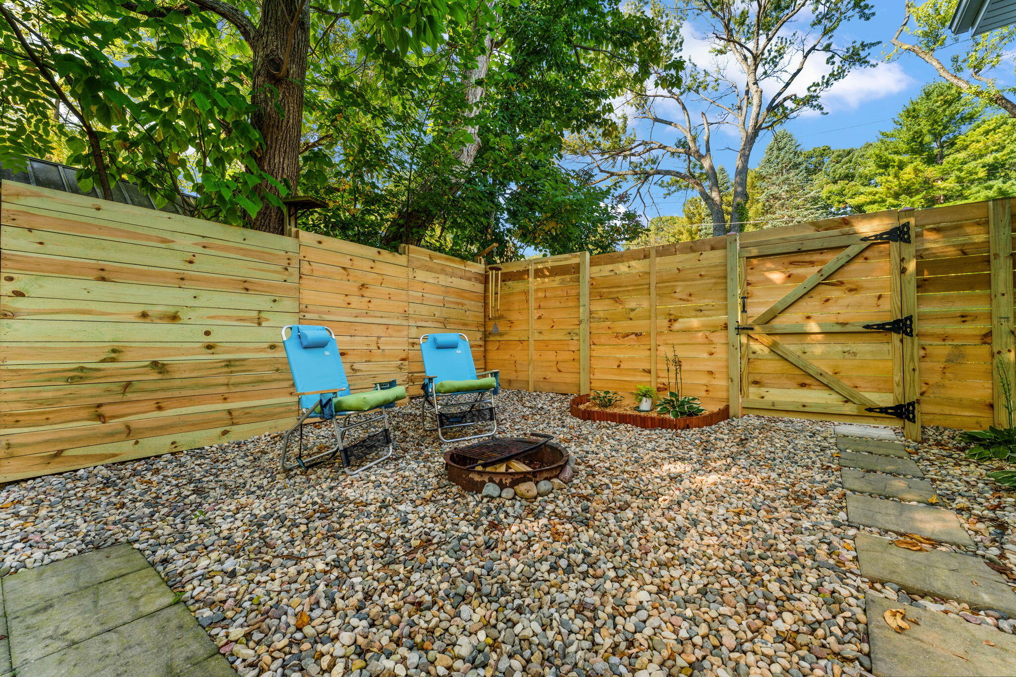 4200 Cardinal Lane Valparaiso, IN 46383 - Photo 43 of 44 a backyard of a house with blue lights