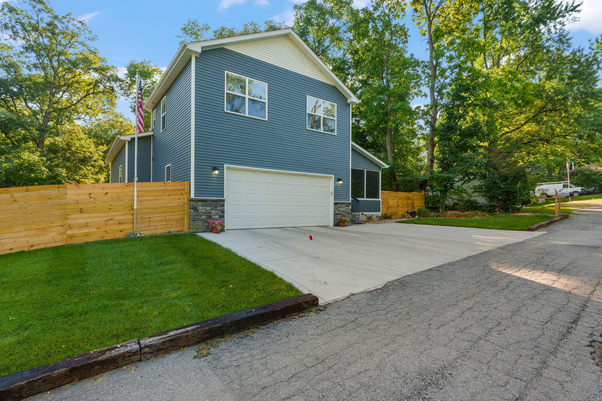 4200 Cardinal Lane Valparaiso, IN 46383 - Photo 44 of 44 a front view of house with yard and trees in the background
