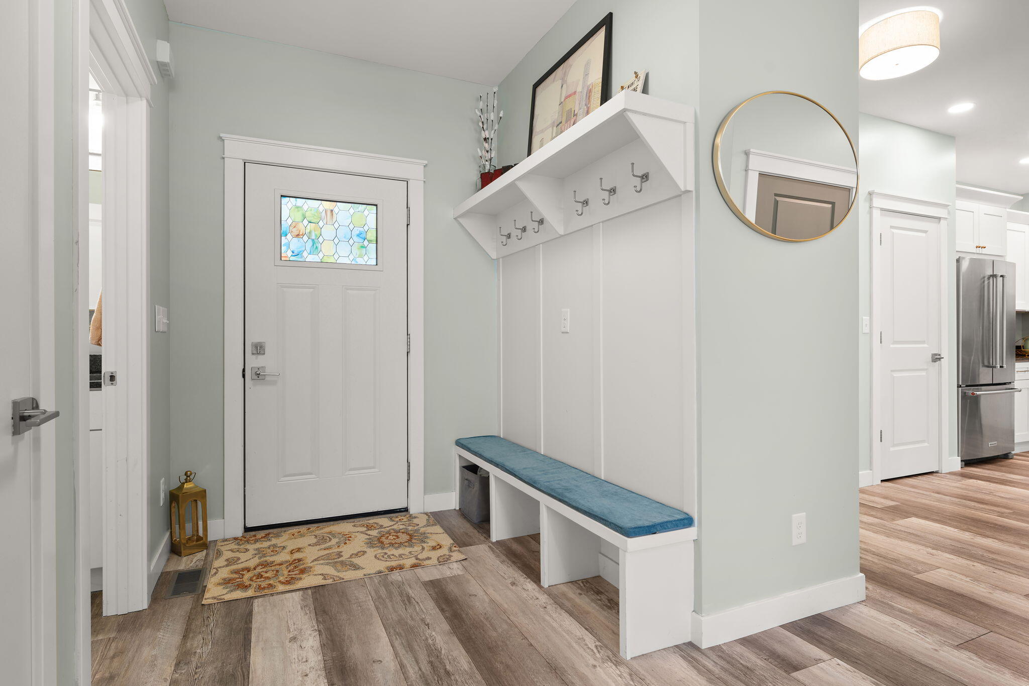 4200 Cardinal Lane Valparaiso, IN 46383 - Photo 5 of 44 a view of a hallway with entryway and wooden floor