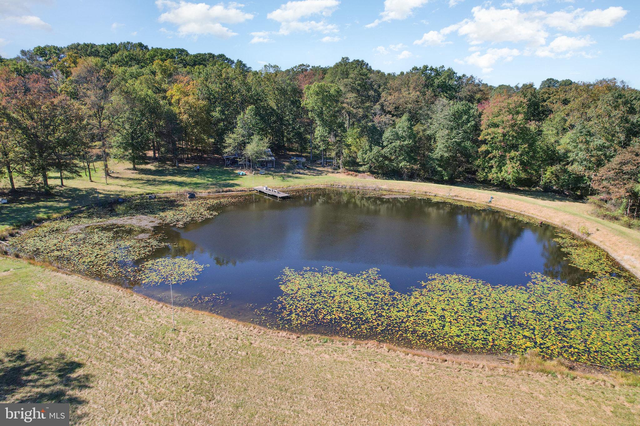 474 Ridge Road Gettysburg, PA 17325 - Photo 15 of 23 a view of a lake with a yard