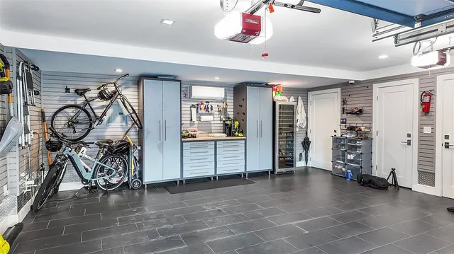 a bedroom with a bed and a chair