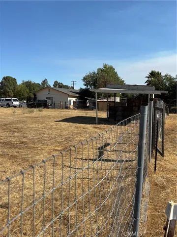 a front view of a house with mountain view