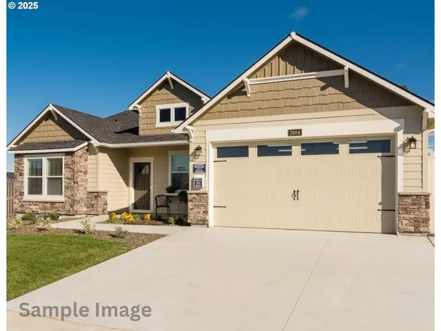 a view of house with yard