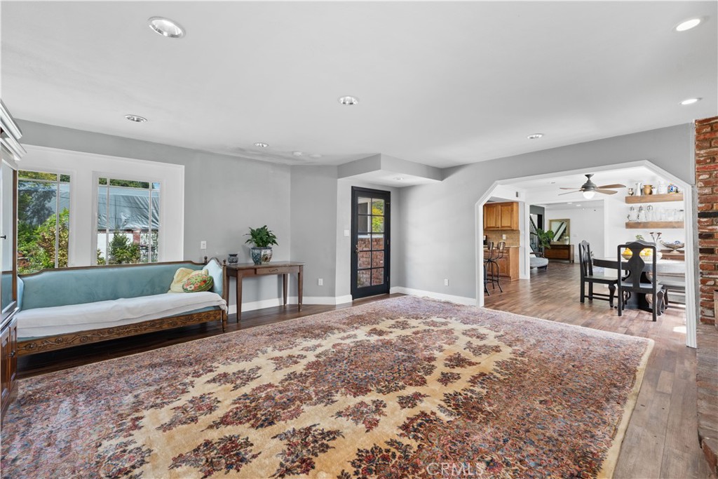 24405 Derian Drive Newhall, CA 91321 - Photo 16 of 44 a living room with furniture and wooden floor