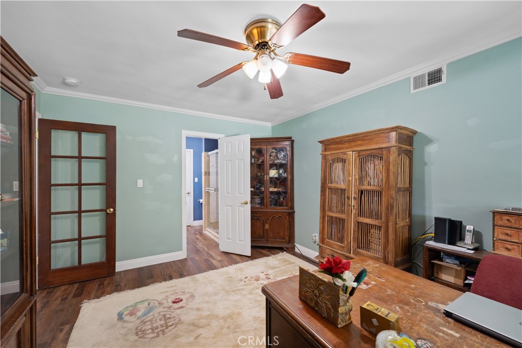 24405 Derian Drive Newhall, CA 91321 - Photo 17 of 44 a living room with furniture and a flat screen tv