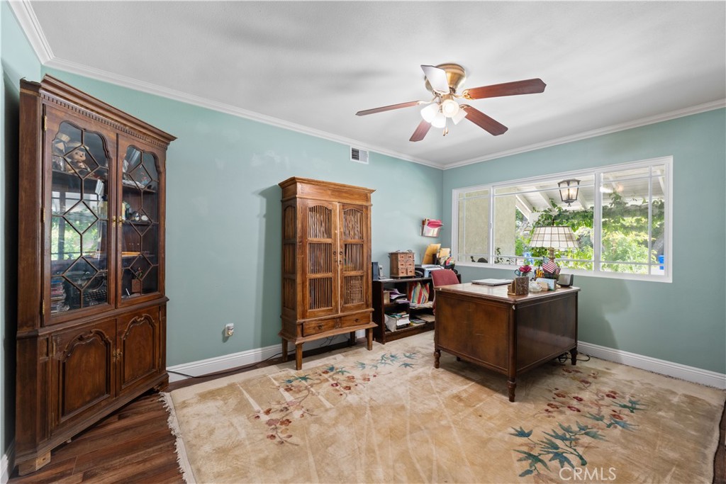 24405 Derian Drive Newhall, CA 91321 - Photo 18 of 44 a living room with furniture and a window