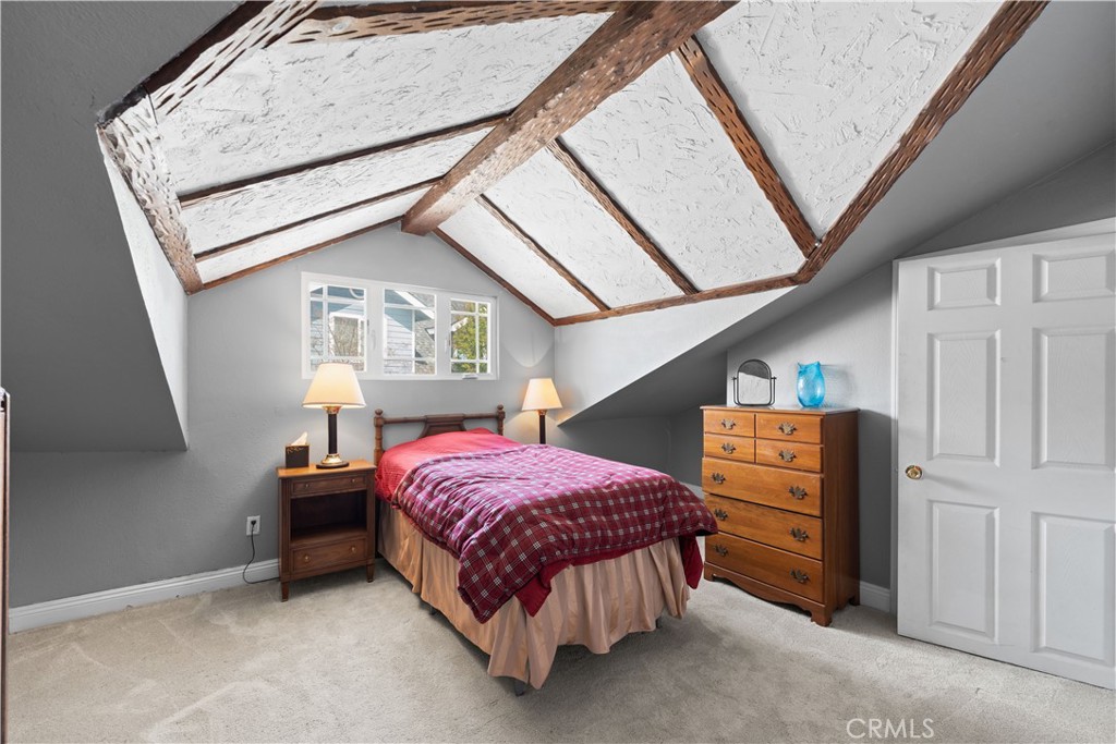 24405 Derian Drive Newhall, CA 91321 - Photo 24 of 44 a bed room with a bed and a window