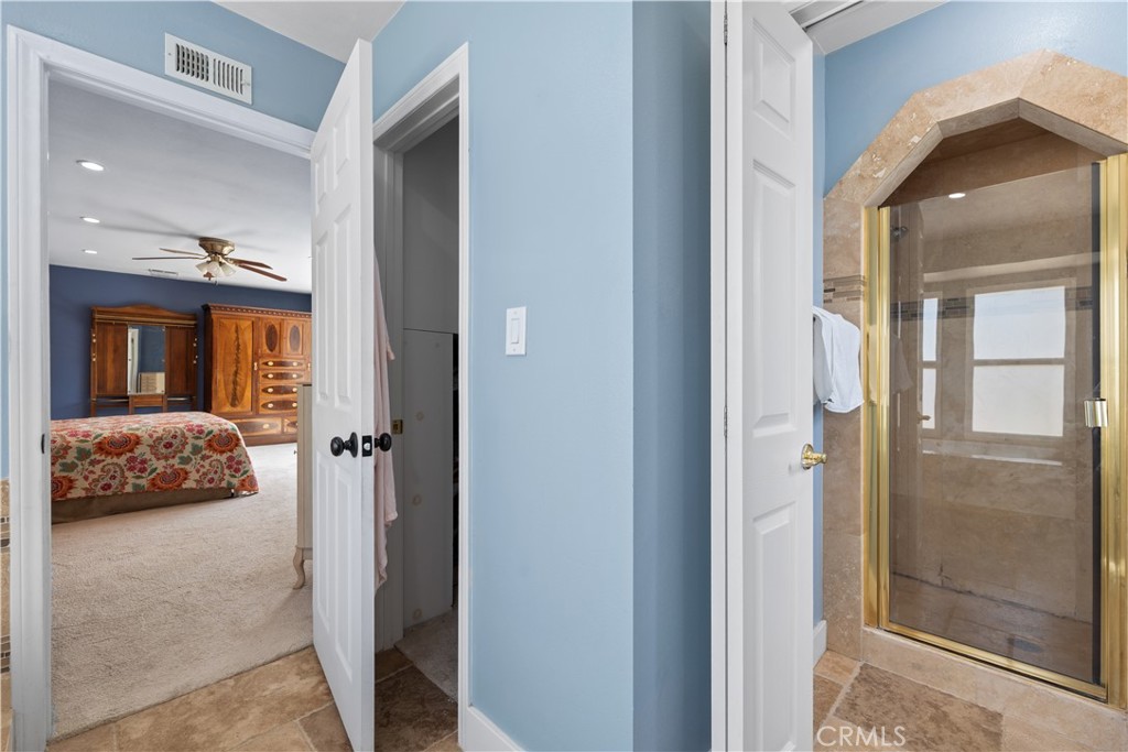 24405 Derian Drive Newhall, CA 91321 - Photo 32 of 44 a view of a bedroom from a hallway