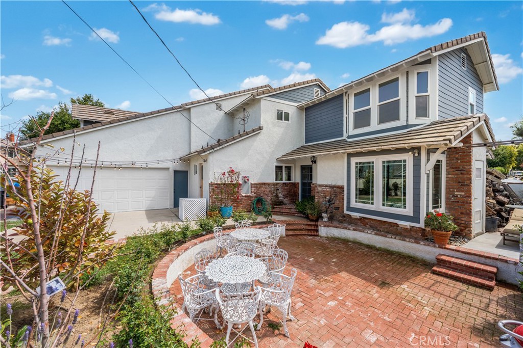 24405 Derian Drive Newhall, CA 91321 - Photo 33 of 44 a house view with a outdoor space