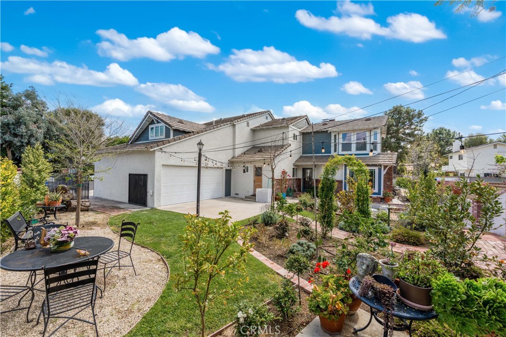 24405 Derian Drive Newhall, CA 91321 - Photo 39 of 44 a house view with a garden space