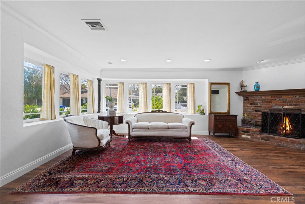 24405 Derian Drive Newhall, CA 91321 - Photo 5 of 44 a living room with furniture and a fireplace