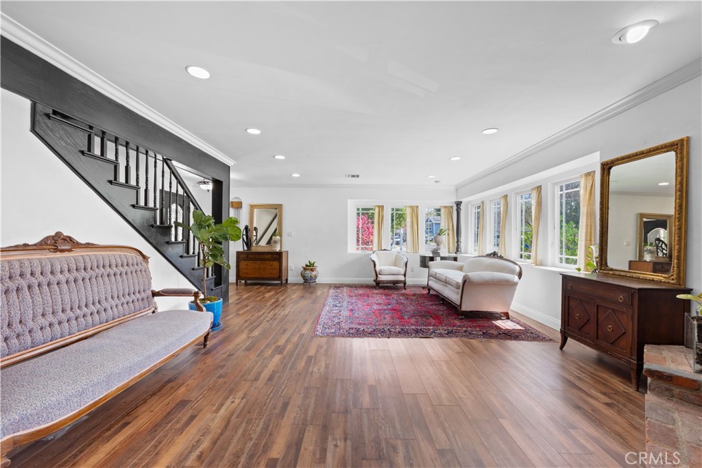 24405 Derian Drive Newhall, CA 91321 - Photo 7 of 44 a living room with furniture and a wooden floor
