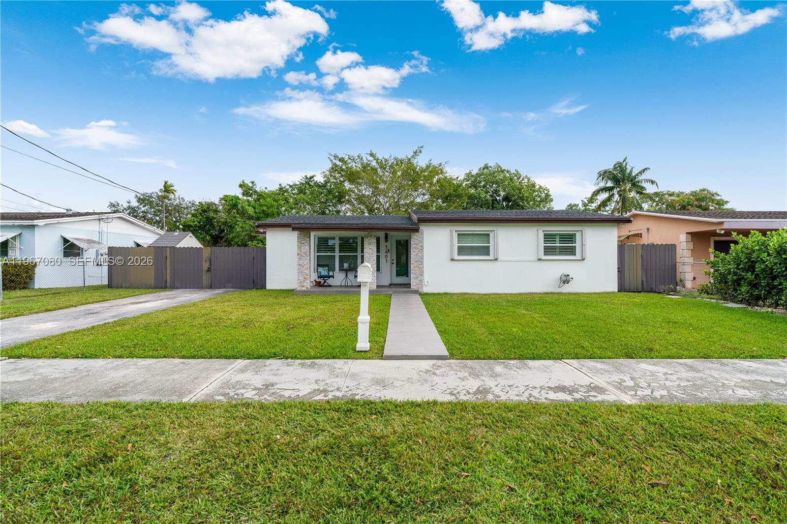 1401 Southwest 94th Avenue Miami, FL 33174 - Photo 1 of 27 a view of outdoor space yard and front view of a house