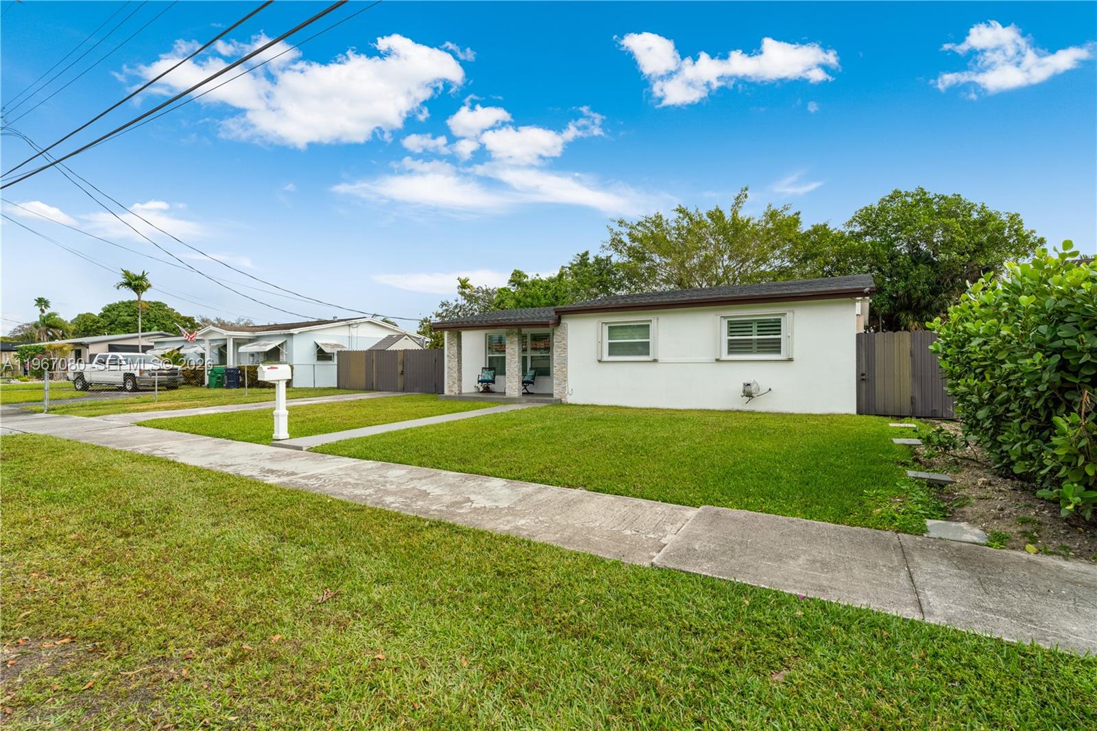 1401 Southwest 94th Avenue Miami, FL 33174 - Photo 2 of 27 a view of a house with a backyard
