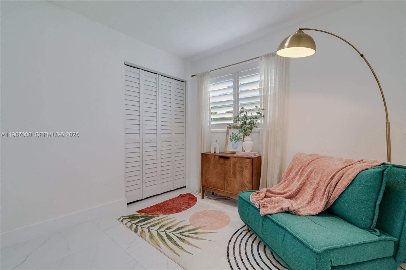 1401 Southwest 94th Avenue Miami, FL 33174 - Photo 21 of 27 a bedroom with a bed and a window