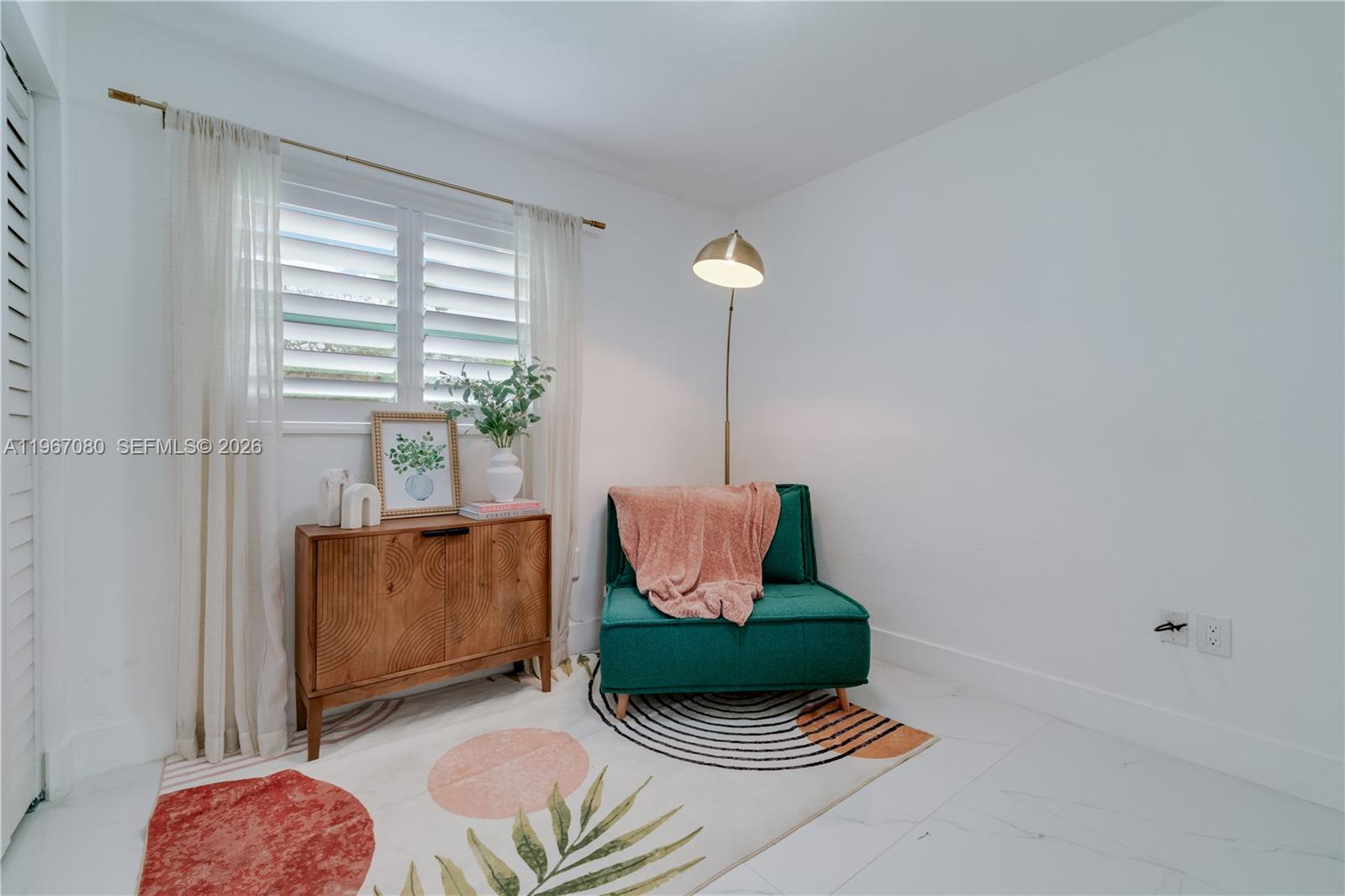 1401 Southwest 94th Avenue Miami, FL 33174 - Photo 22 of 27 a living room with furniture and a window