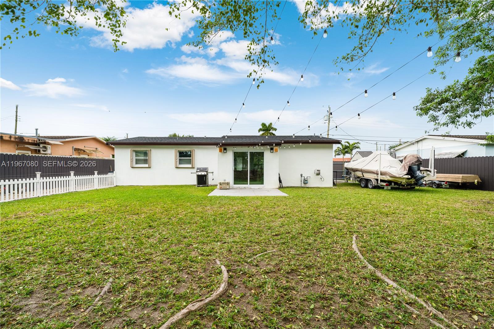 1401 Southwest 94th Avenue Miami, FL 33174 - Photo 23 of 27 a front view of a house with a garden