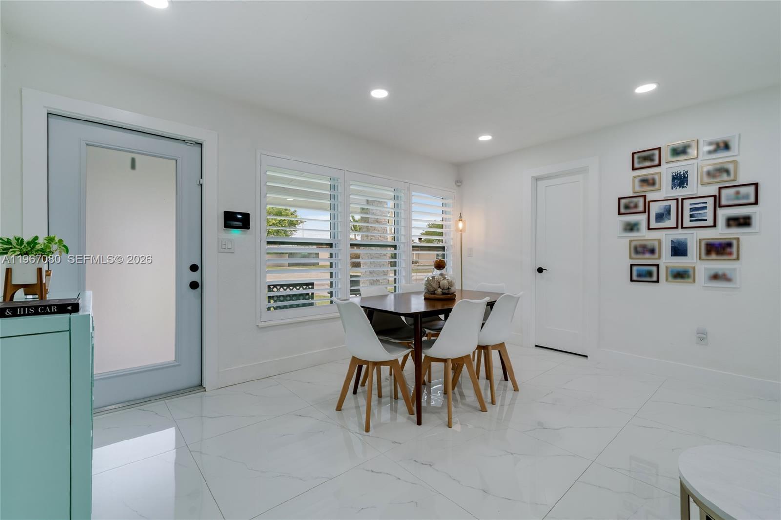 1401 Southwest 94th Avenue Miami, FL 33174 - Photo 6 of 27 a view of a dining room with furniture