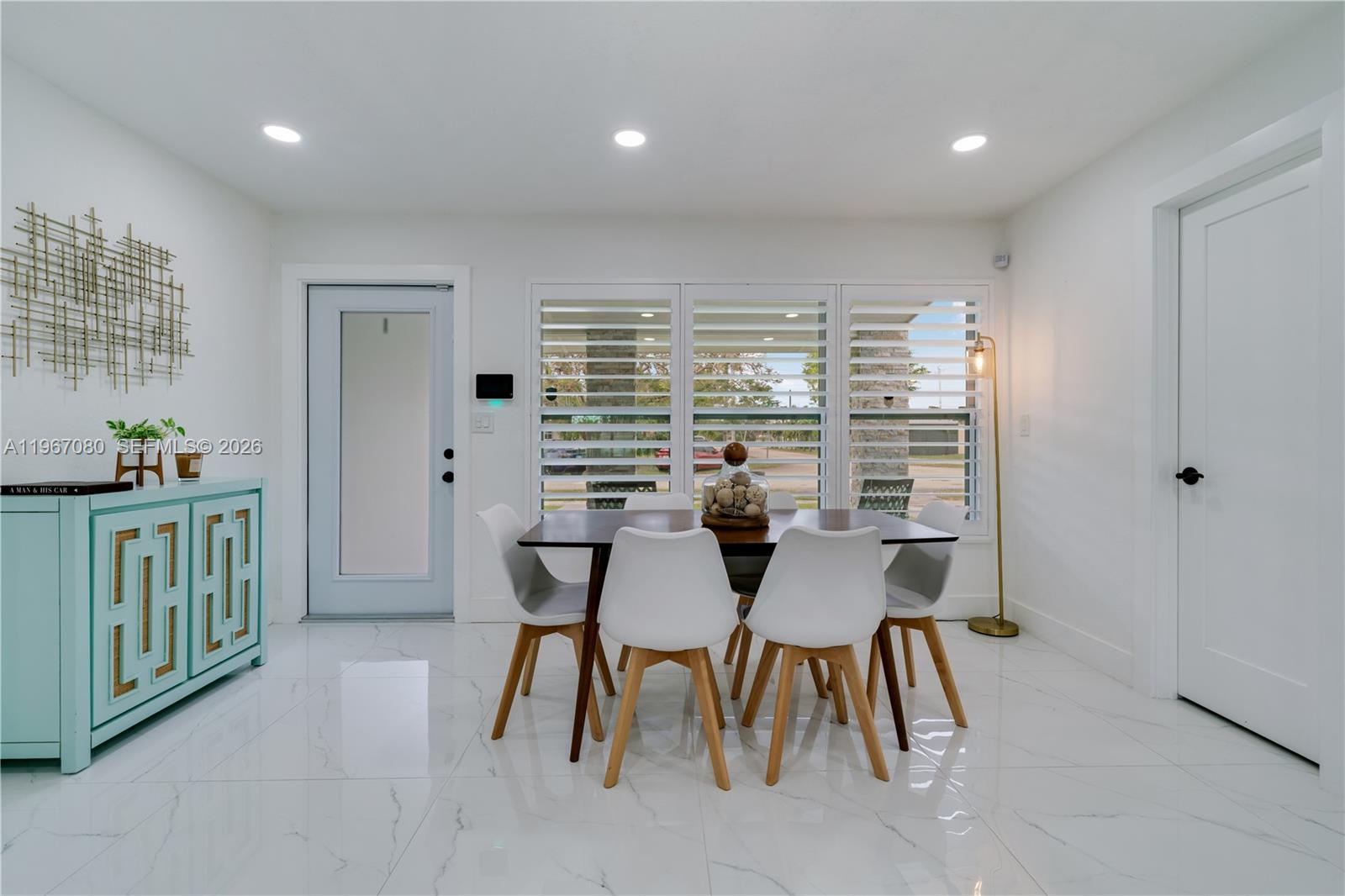 1401 Southwest 94th Avenue Miami, FL 33174 - Photo 7 of 27 a dining room with furniture and a window