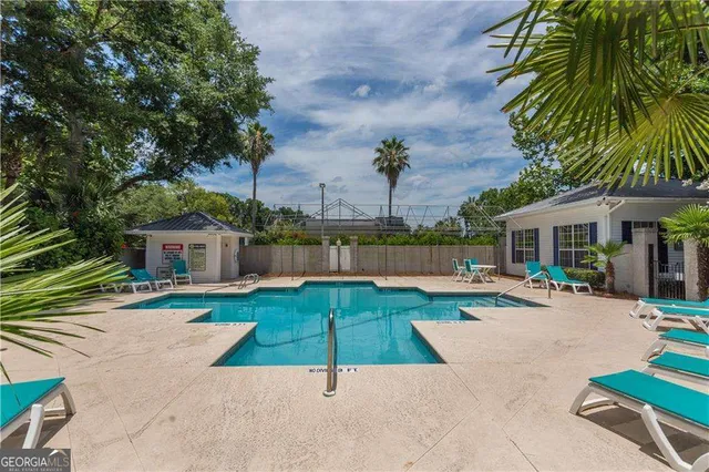 a view of a backyard with a garden and plants