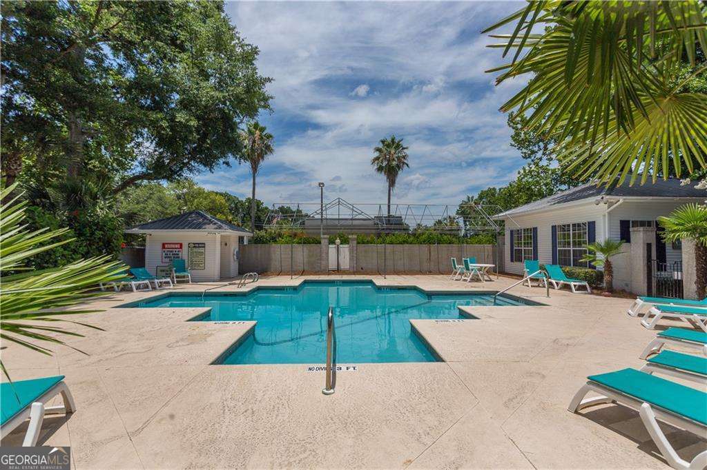 143 South Island Square Drive St. Simons, GA 31522 - Photo 26 of 26 a view of a backyard with a garden and plants