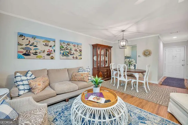 a living room with furniture and a table