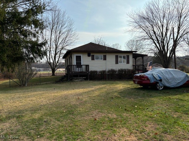 9517 Brick Church Road Cambridge, OH 43725 - Photo 19 of 26 View of front of house featuring a front lawn