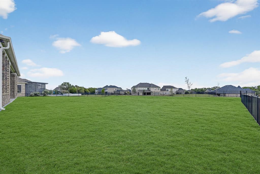 1420 Wolf Ridge Run Gunter, TX 75058 - Photo 21 of 40 a view of a green field