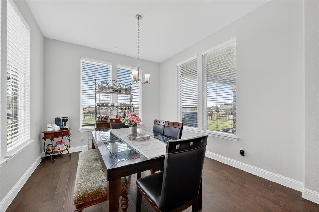 1420 Wolf Ridge Run Gunter, TX 75058 - Photo 31 of 40 a view of a dining room with furniture and window