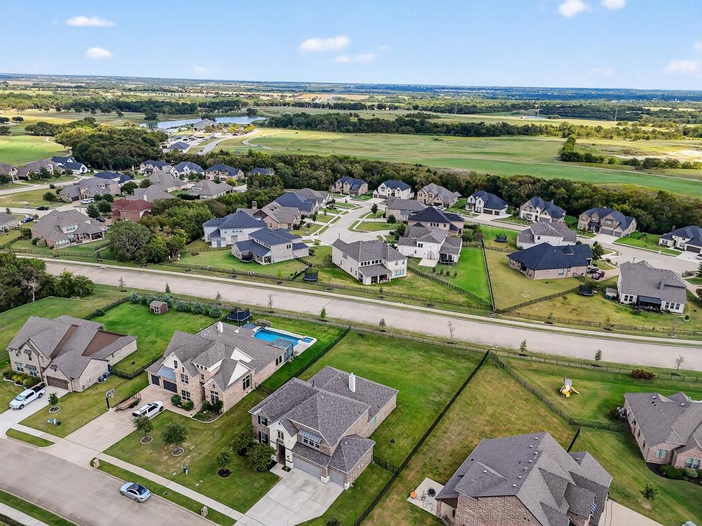 1420 Wolf Ridge Run Gunter, TX 75058 - Photo 5 of 40 an aerial view of a house with a ocean view