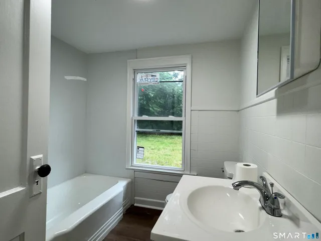 a bathroom with a sink and a bathtub