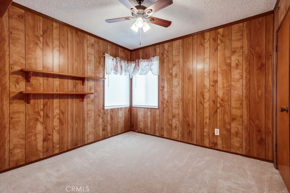 11639 Harvard Drive Norwalk, CA 90650 - Photo 19 of 33 a view of entryway with wooden walls