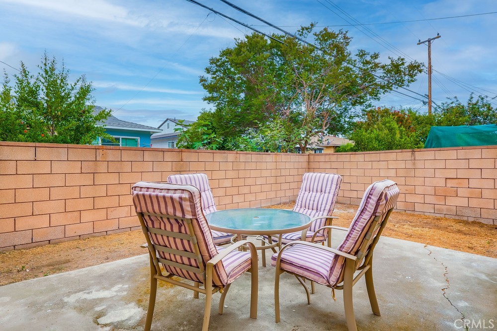 11639 Harvard Drive Norwalk, CA 90650 - Photo 31 of 33 a patio with table and chairs