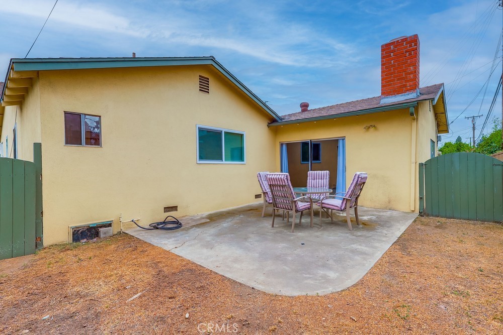 11639 Harvard Drive Norwalk, CA 90650 - Photo 33 of 33 a backyard of a house with table and chairs
