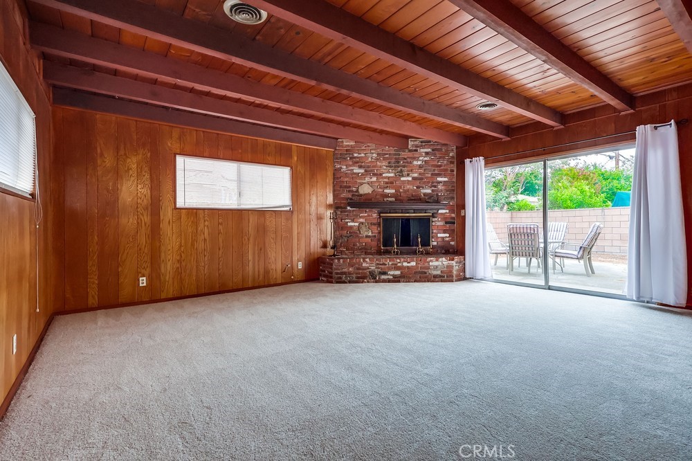 11639 Harvard Drive Norwalk, CA 90650 - Photo 7 of 33 a view of empty room with a fireplace