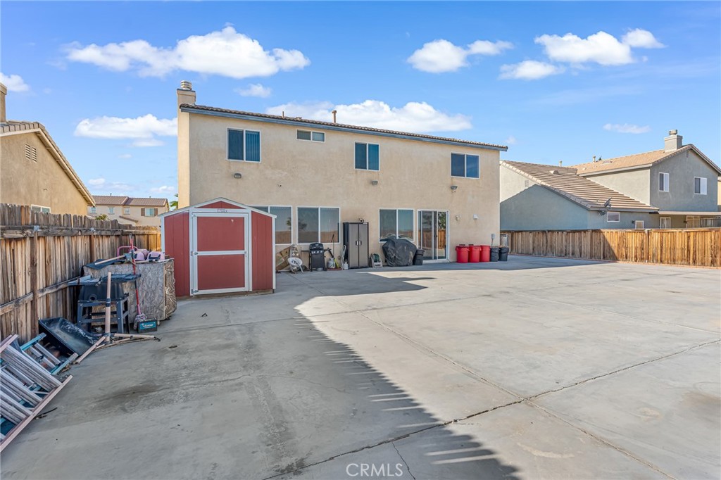 11036 Windcrest Court Adelanto, CA 92301 - Photo 33 of 45 a view of the house with entertaining space
