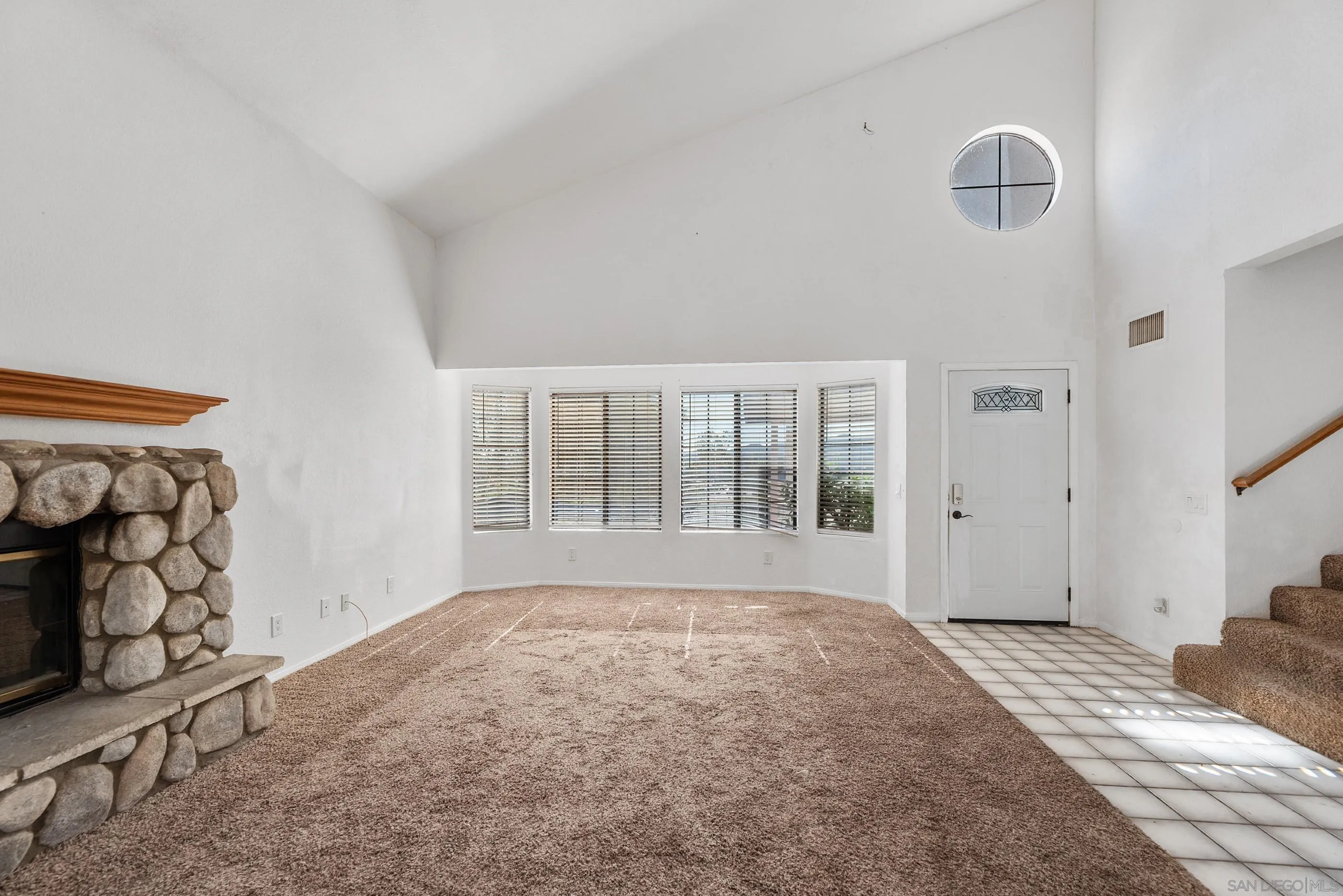 24252 Sargeant Road Ramona, CA 92065 - Photo 15 of 57 a bedroom with a bed and a window