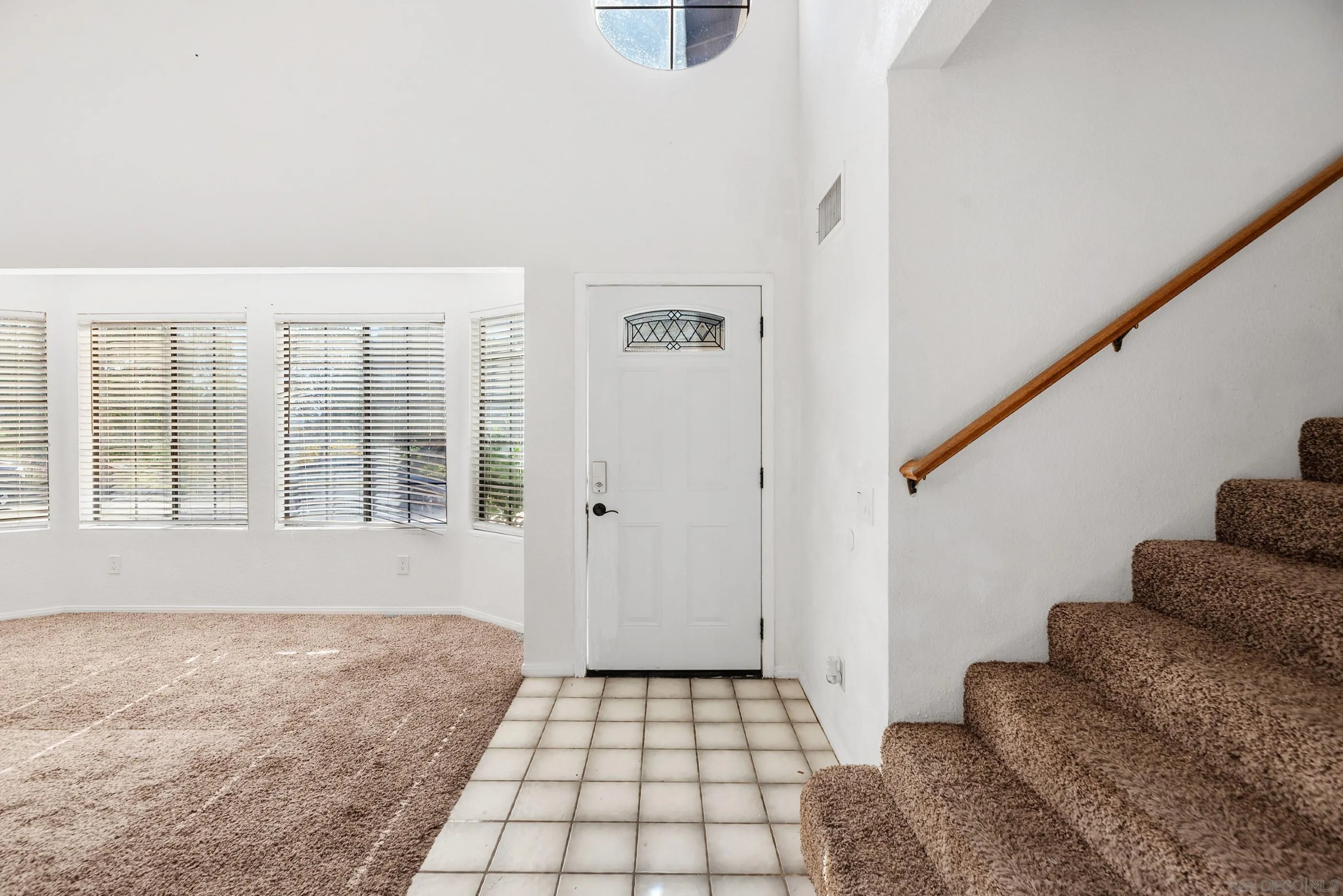 24252 Sargeant Road Ramona, CA 92065 - Photo 20 of 57 a living room with furniture and a window