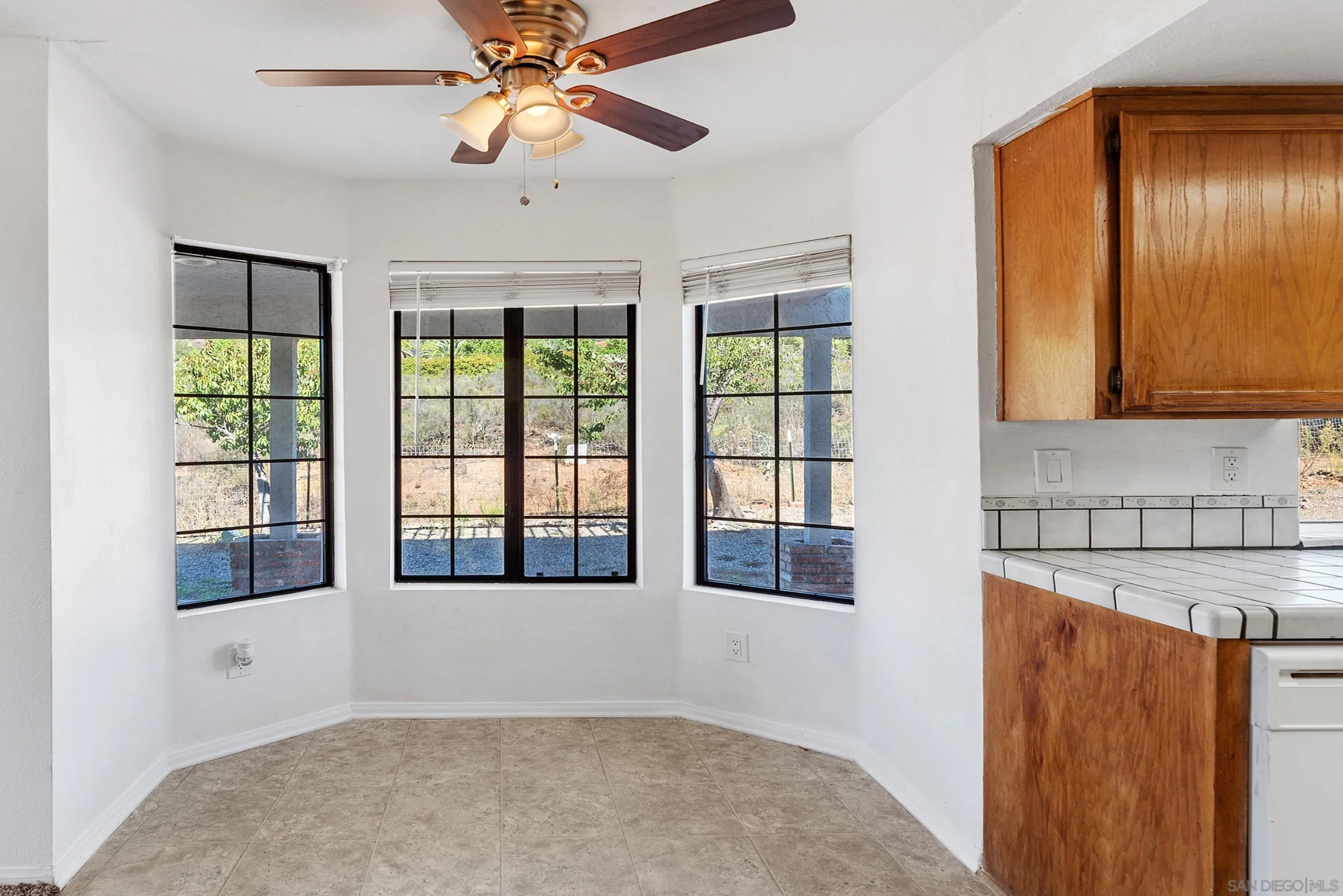 24252 Sargeant Road Ramona, CA 92065 - Photo 25 of 57 a view of an empty room with a window