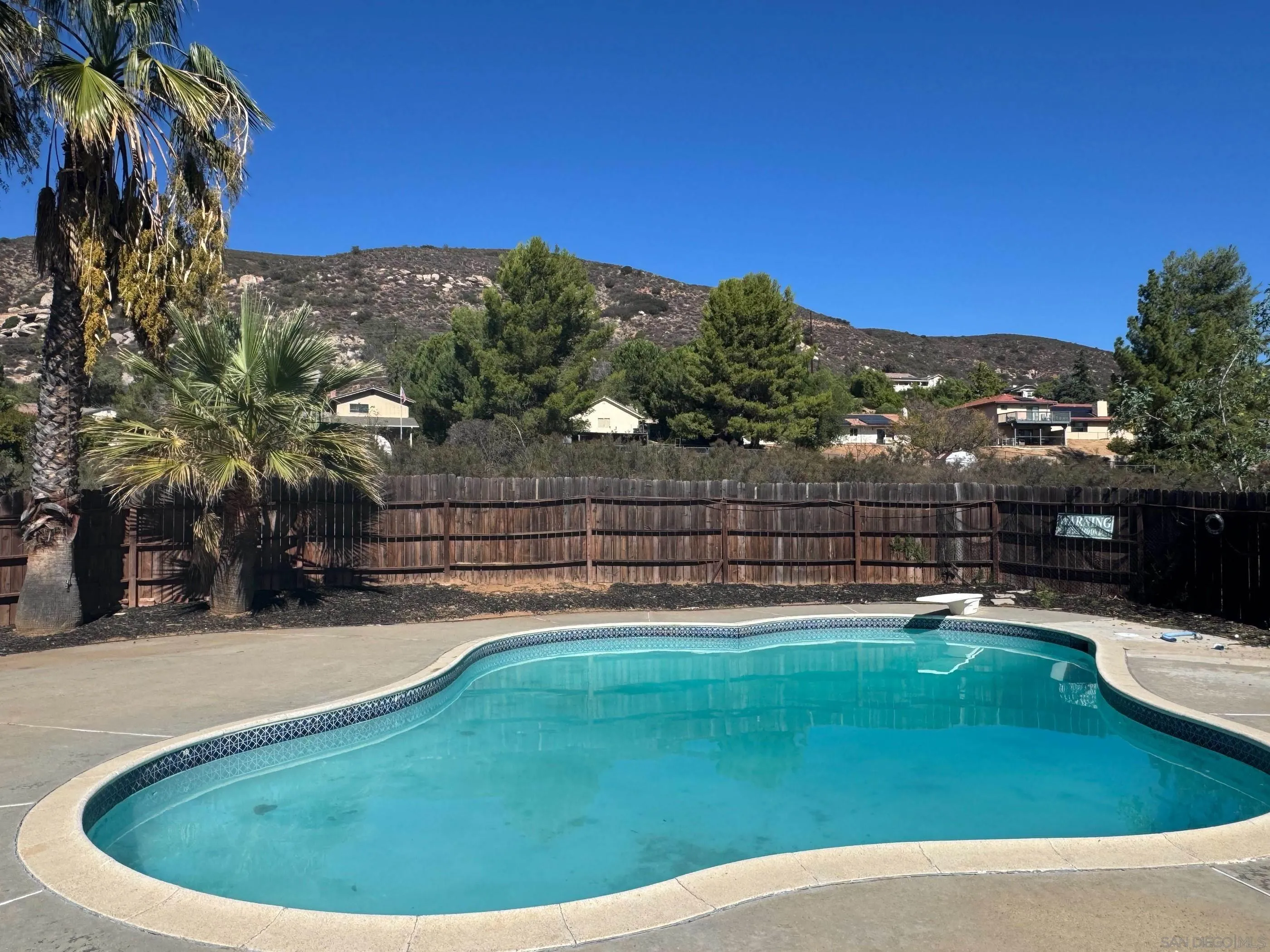 24252 Sargeant Road Ramona, CA 92065 - Photo 56 of 57 a view of a garden with a slide