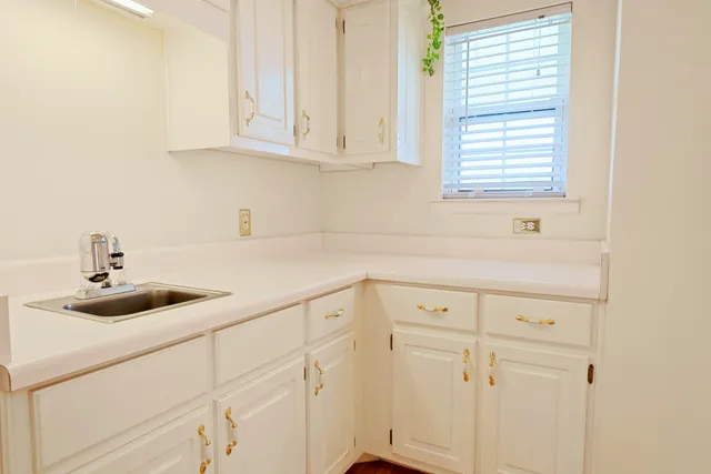 a bathroom with a sink toilet and bathtub
