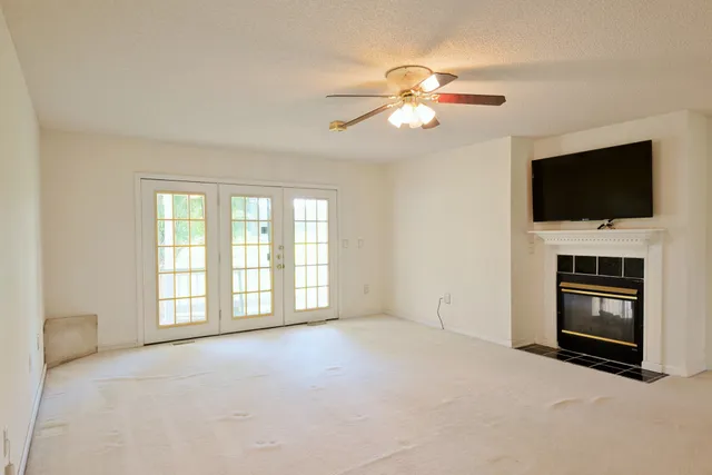 a kitchen with a stove and a refrigerator