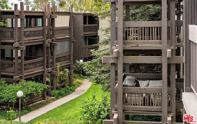 a view of a porch with a bench