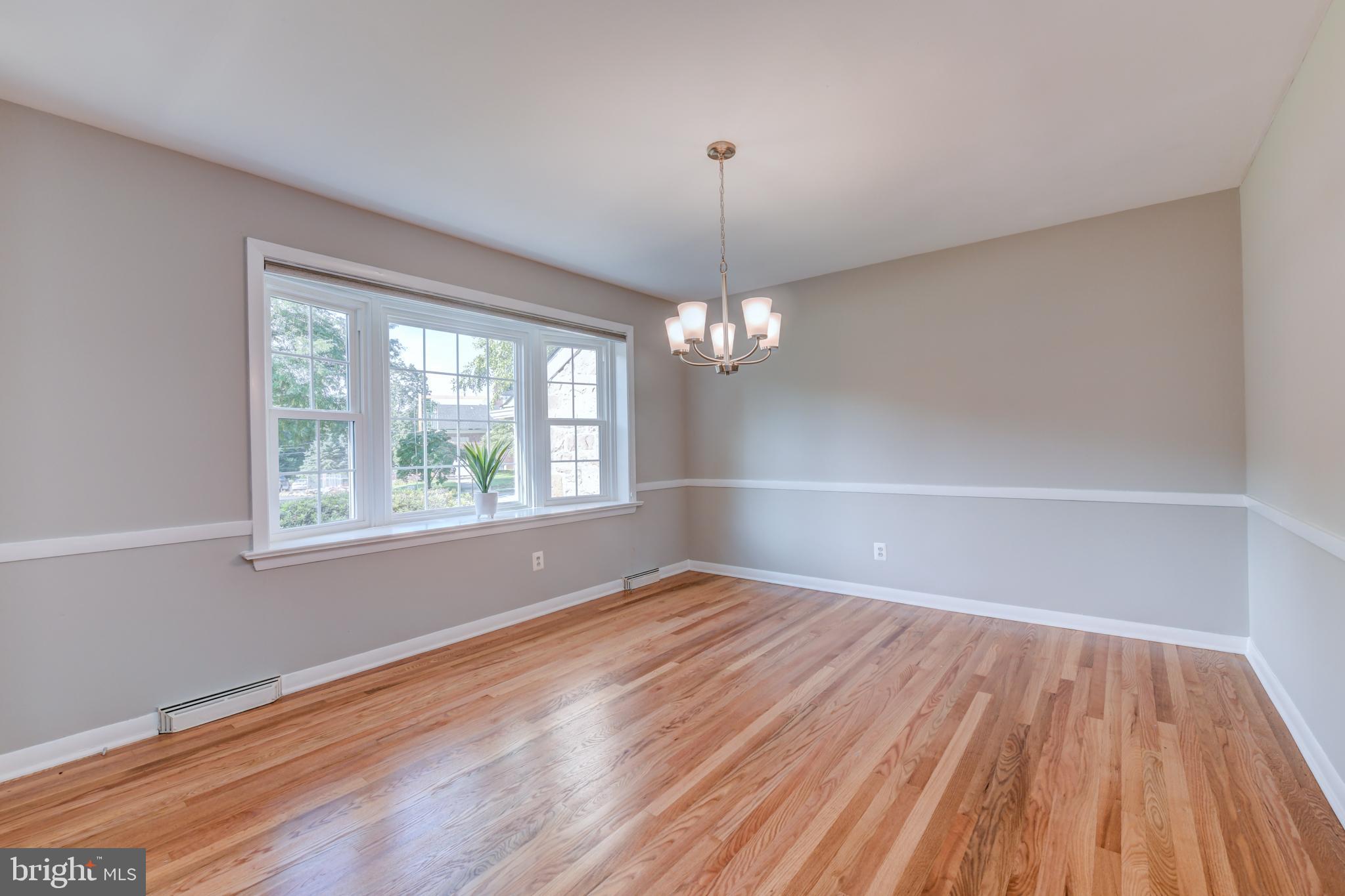 1165 Beverly Road Jenkintown, PA 19046 - Photo 12 of 31 a view of empty room with wooden floor and fan
