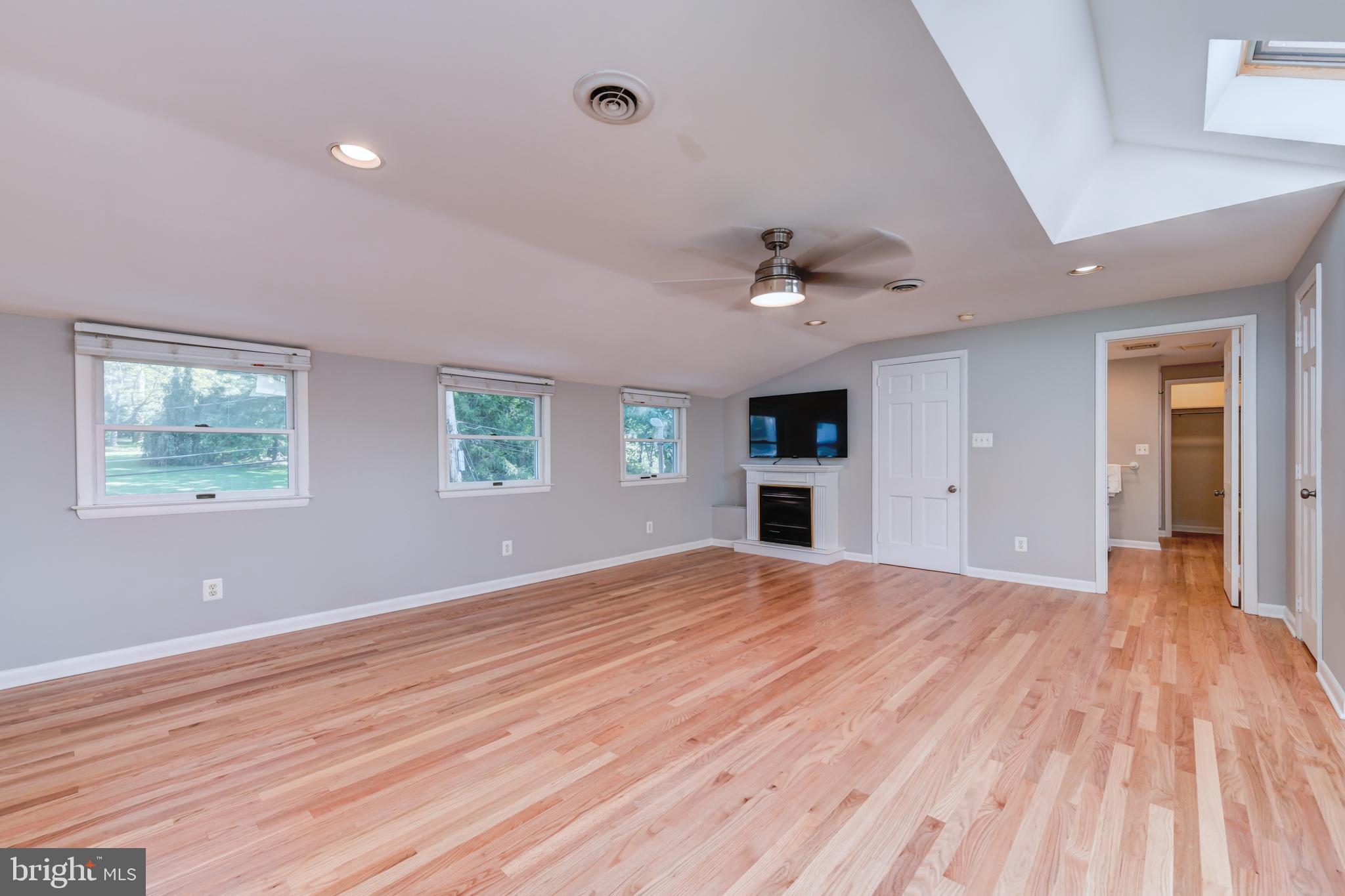 1165 Beverly Road Jenkintown, PA 19046 - Photo 16 of 31 a view of empty room with wooden floor and fan